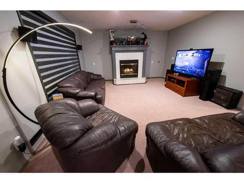 10397 Hamptons Boulevard Nw, Calgary, AB - Indoor Photo Showing Other Room With Fireplace