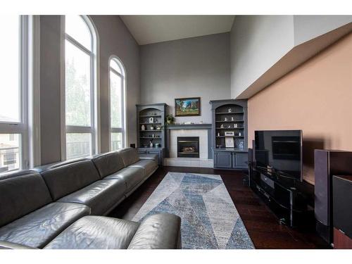 10397 Hamptons Boulevard Nw, Calgary, AB - Indoor Photo Showing Living Room With Fireplace