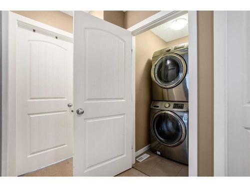 284 Marquis Heights Se, Calgary, AB - Indoor Photo Showing Laundry Room