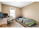 284 Marquis Heights Se, Calgary, AB  - Indoor Photo Showing Bedroom 