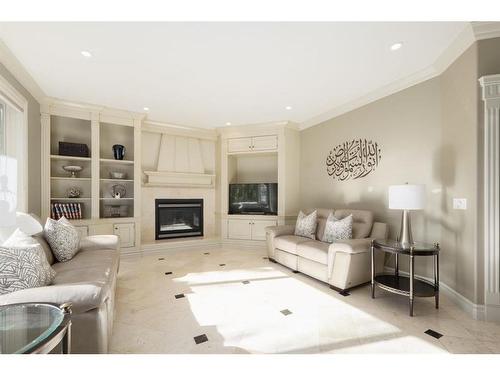 11 Aspen Ridge Lane Sw, Calgary, AB - Indoor Photo Showing Living Room With Fireplace