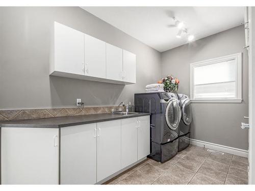11 Aspen Ridge Lane Sw, Calgary, AB - Indoor Photo Showing Laundry Room