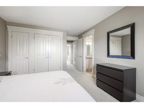 11 Aspen Ridge Lane Sw, Calgary, AB - Indoor Photo Showing Bedroom