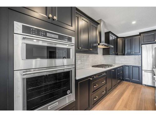141 Marina Cove Se, Calgary, AB - Indoor Photo Showing Kitchen With Stainless Steel Kitchen With Upgraded Kitchen