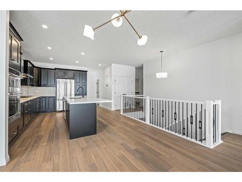 141 Marina Cove Se, Calgary, AB - Indoor Photo Showing Kitchen With Stainless Steel Kitchen With Upgraded Kitchen