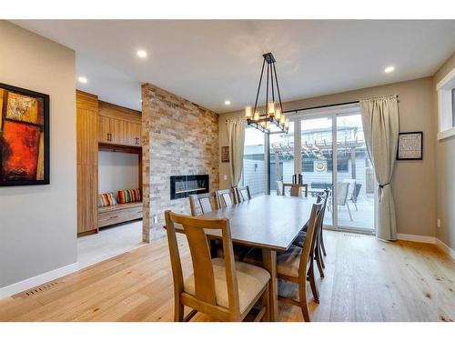 3111 5 Street Nw, Calgary, AB - Indoor Photo Showing Dining Room With Fireplace