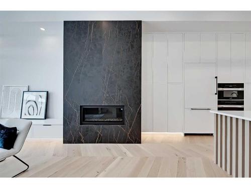 2632 5 Avenue Nw, Calgary, AB - Indoor With Fireplace