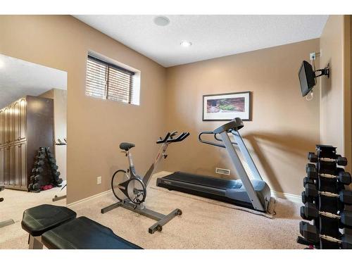 143 Arbour Stone Rise Nw, Calgary, AB - Indoor Photo Showing Gym Room