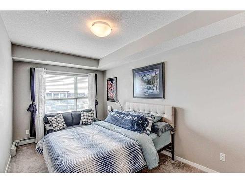 301-4350 Seton Drive Se, Calgary, AB - Indoor Photo Showing Bedroom