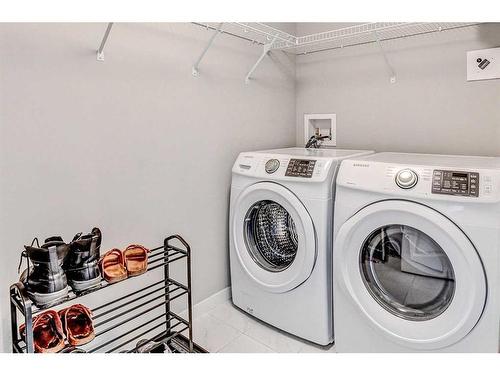 301-4350 Seton Drive Se, Calgary, AB - Indoor Photo Showing Laundry Room
