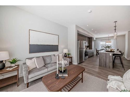 408 Shawnee Square Sw, Calgary, AB - Indoor Photo Showing Living Room