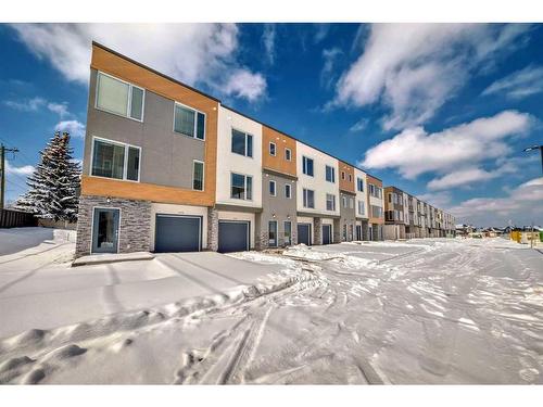 408 Shawnee Square Sw, Calgary, AB - Outdoor With Facade