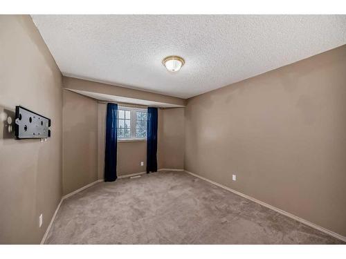 622 Mckenzie Lake Bay Se, Calgary, AB - Indoor Photo Showing Other Room