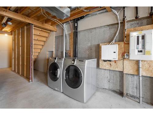372 Panatella Boulevard Nw, Calgary, AB - Indoor Photo Showing Laundry Room