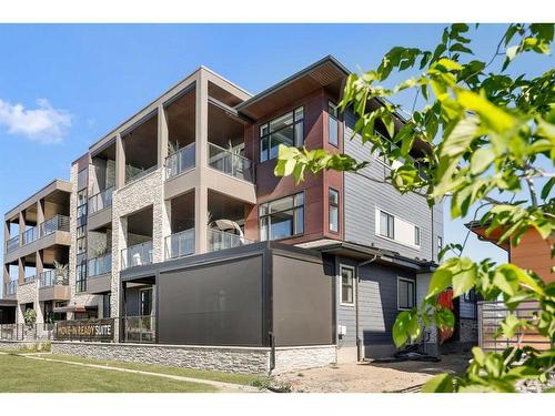 302-190 Marina Cove Se, Calgary, AB - Indoor Photo Showing Kitchen With Upgraded Kitchen