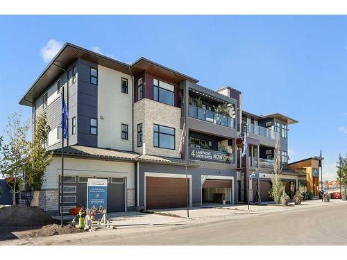 302-190 Marina Cove Se, Calgary, AB - Indoor Photo Showing Kitchen With Upgraded Kitchen