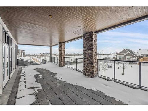 201-110 Marina Cove Se, Calgary, AB - Outdoor With Deck Patio Veranda With Exterior