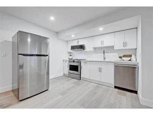 115 Edgepark Boulevard Nw, Calgary, AB - Indoor Photo Showing Kitchen With Stainless Steel Kitchen