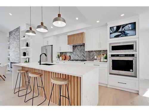 115 Edgepark Boulevard Nw, Calgary, AB - Indoor Photo Showing Kitchen With Upgraded Kitchen