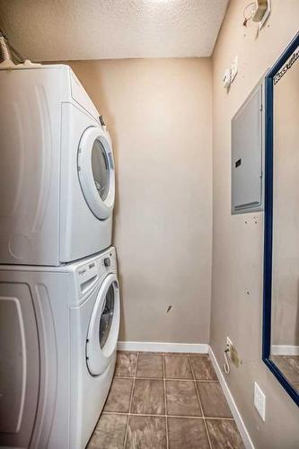 1304-1140 Taradale Drive Ne, Calgary, AB - Indoor Photo Showing Laundry Room