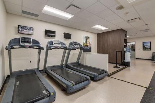 602A-500 Eau Claire Avenue Sw, Calgary, AB - Indoor Photo Showing Gym Room