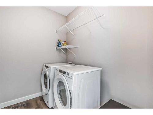52 Walcrest View Se, Calgary, AB - Indoor Photo Showing Laundry Room