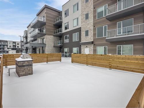 215-200 Shawnee Square Sw, Calgary, AB - Outdoor With Balcony