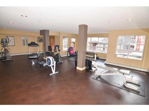 340-22 Richard Place Sw, Calgary, AB - Indoor Photo Showing Gym Room