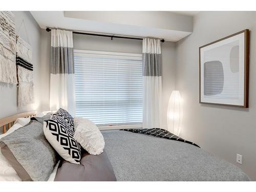 1111-550 Belmont Street Sw, Calgary, AB - Indoor Photo Showing Bedroom