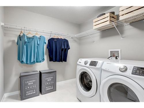 1111-550 Belmont Street Sw, Calgary, AB - Indoor Photo Showing Laundry Room