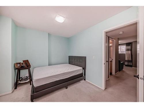 58 Erin Woods Court Se, Calgary, AB - Indoor Photo Showing Bedroom