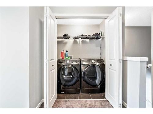 1010 Evansridge Park Nw, Calgary, AB - Indoor Photo Showing Laundry Room