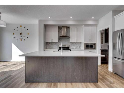 113 Creekside Way Sw, Calgary, AB - Indoor Photo Showing Kitchen With Upgraded Kitchen