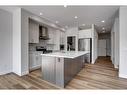 113 Creekside Way Sw, Calgary, AB  - Indoor Photo Showing Kitchen With Upgraded Kitchen 