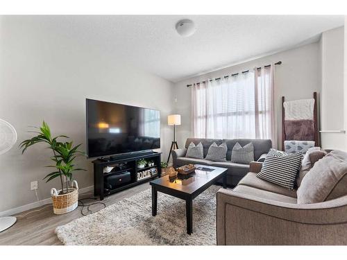 614 Copperpond Boulevard Se, Calgary, AB - Indoor Photo Showing Living Room