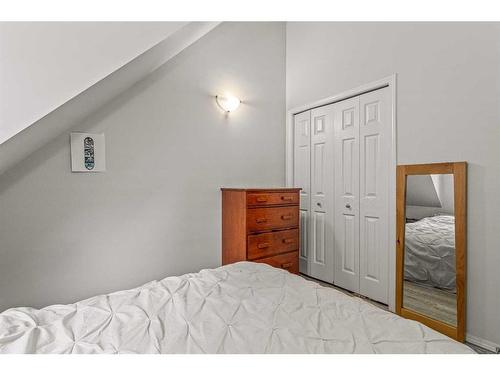 306-343 Marten Street, Banff, AB - Indoor Photo Showing Bedroom