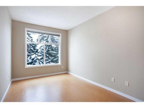 1101-1010 Arbour Lake Road Nw, Calgary, AB - Indoor Photo Showing Other Room