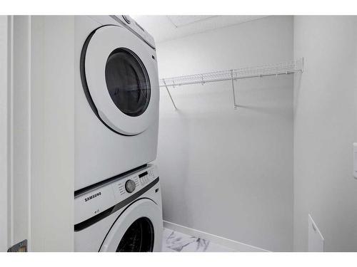 5320-20295 Seton Way Se, Calgary, AB - Indoor Photo Showing Laundry Room