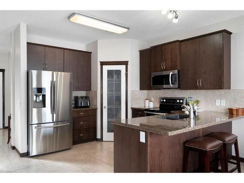 122 Saddleland Crescent Ne, Calgary, AB - Indoor Photo Showing Kitchen With Double Sink With Upgraded Kitchen