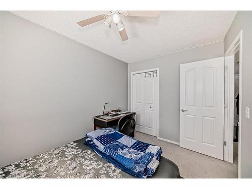 51 Saddlecrest Close Ne, Calgary, AB - Indoor Photo Showing Bedroom