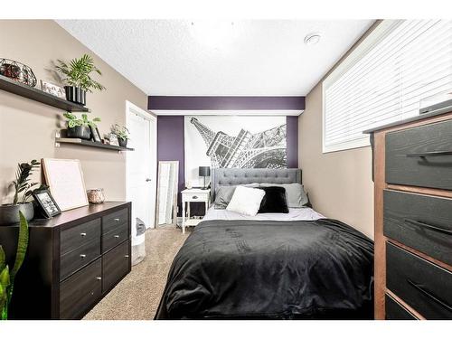 137 Heritage Hill, Cochrane, AB - Indoor Photo Showing Bedroom