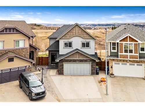 137 Heritage Hill, Cochrane, AB - Outdoor With Facade