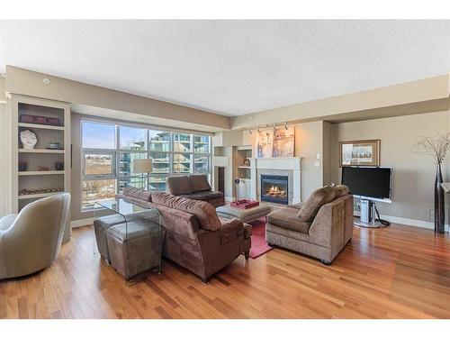801-110 7 Street Sw, Calgary, AB - Indoor Photo Showing Living Room With Fireplace