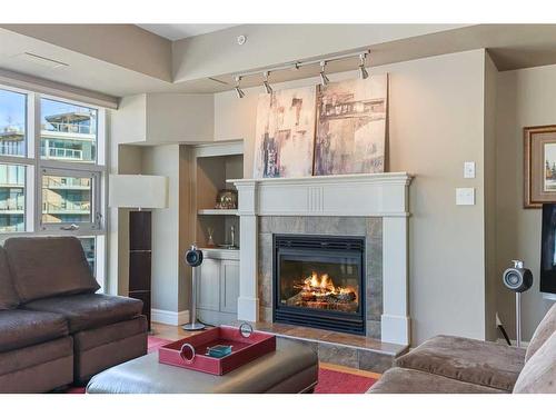 801-110 7 Street Sw, Calgary, AB - Indoor Photo Showing Living Room With Fireplace