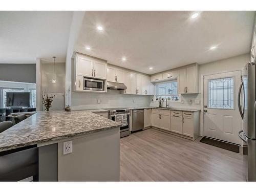 23 Sanderling Rise Nw, Calgary, AB - Indoor Photo Showing Kitchen With Stainless Steel Kitchen With Upgraded Kitchen
