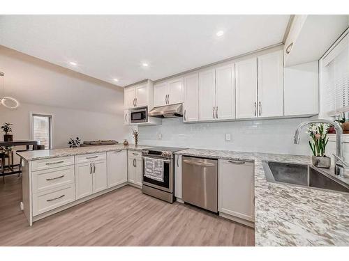 23 Sanderling Rise Nw, Calgary, AB - Indoor Photo Showing Kitchen With Stainless Steel Kitchen With Upgraded Kitchen