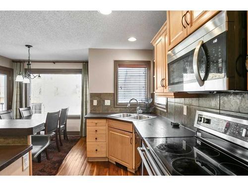 84 Everbrook Drive Sw, Calgary, AB - Indoor Photo Showing Kitchen With Double Sink