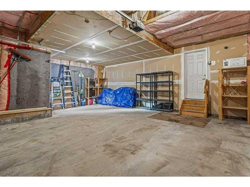 215 Miskow Close, Canmore, AB - Indoor Photo Showing Garage