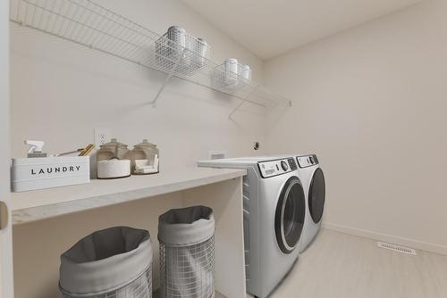 53 Royston Terrace Nw, Calgary, AB - Indoor Photo Showing Laundry Room