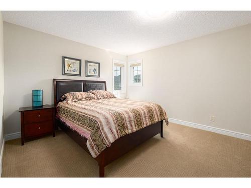 9 Aspen Summit Green Sw, Calgary, AB - Indoor Photo Showing Bedroom